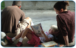 Family Reading Outside